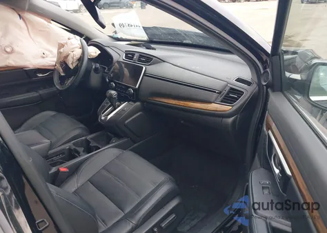 2018 Honda Cr-V Touring z USA, uszkodzony, nr VIN 7FARW2H9XJE067233